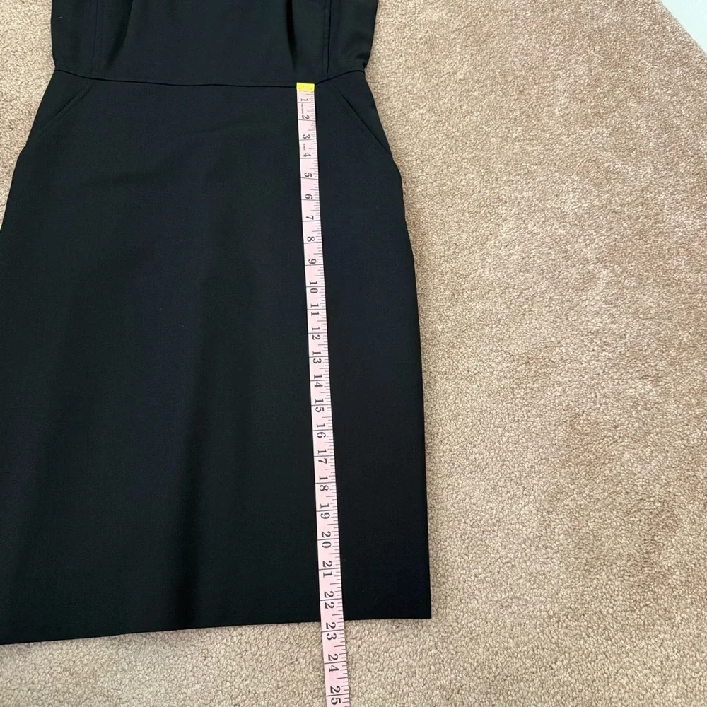 J. Crew Elegant Black Resume Dress. Pockets, back vent and zipper. Sleeveless.